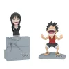 Luffy e Nico Robin numa figura World Collectable de One Piece com 10 cm e base. Um colecionável compacto para fãs dos Chapéus de Palha. Descobre já!