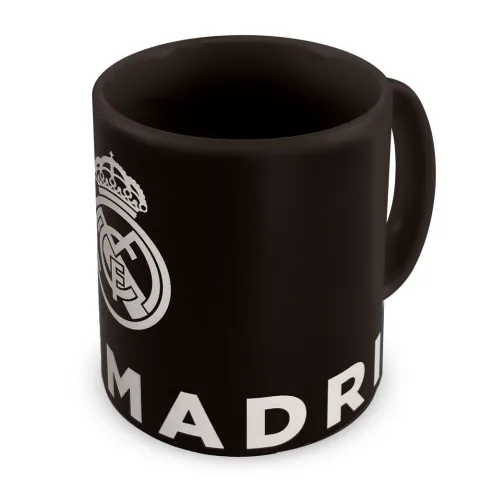 Surpreende-te com a Caneca Mágica Real Madrid de 350 ml da ERIK. O desenho muda com líquidos quentes. Em cerâmica e perfeita para adeptos. Compra já!