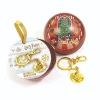 Porta-chaves Chapéu Seletor dourado dentro de uma bola de Natal metálica com os brasões das casas. Presente de Natal Harry Potter da The Carat Shop. Descobre!