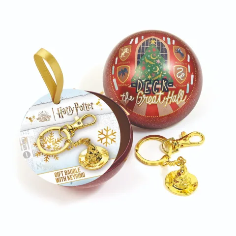 Porta-chaves Chapéu Seletor dourado dentro de uma bola de Natal metálica com os brasões das casas. Presente de Natal Harry Potter da The Carat Shop. Descobre!