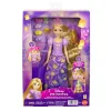 Boneca Rapunzel Reveal de Entrelaçados da Disney com cabelo que se ilumina em dourado ao ser escovado. Inclui escova