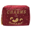 Encontra a nécessaire Charms Harry Potter em veludo vermelho